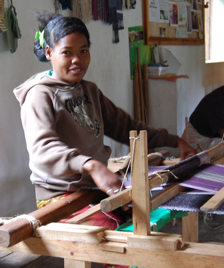 A young weaver with the Famiova Weaving Cooperative. Photo by Jan Gogarten.
