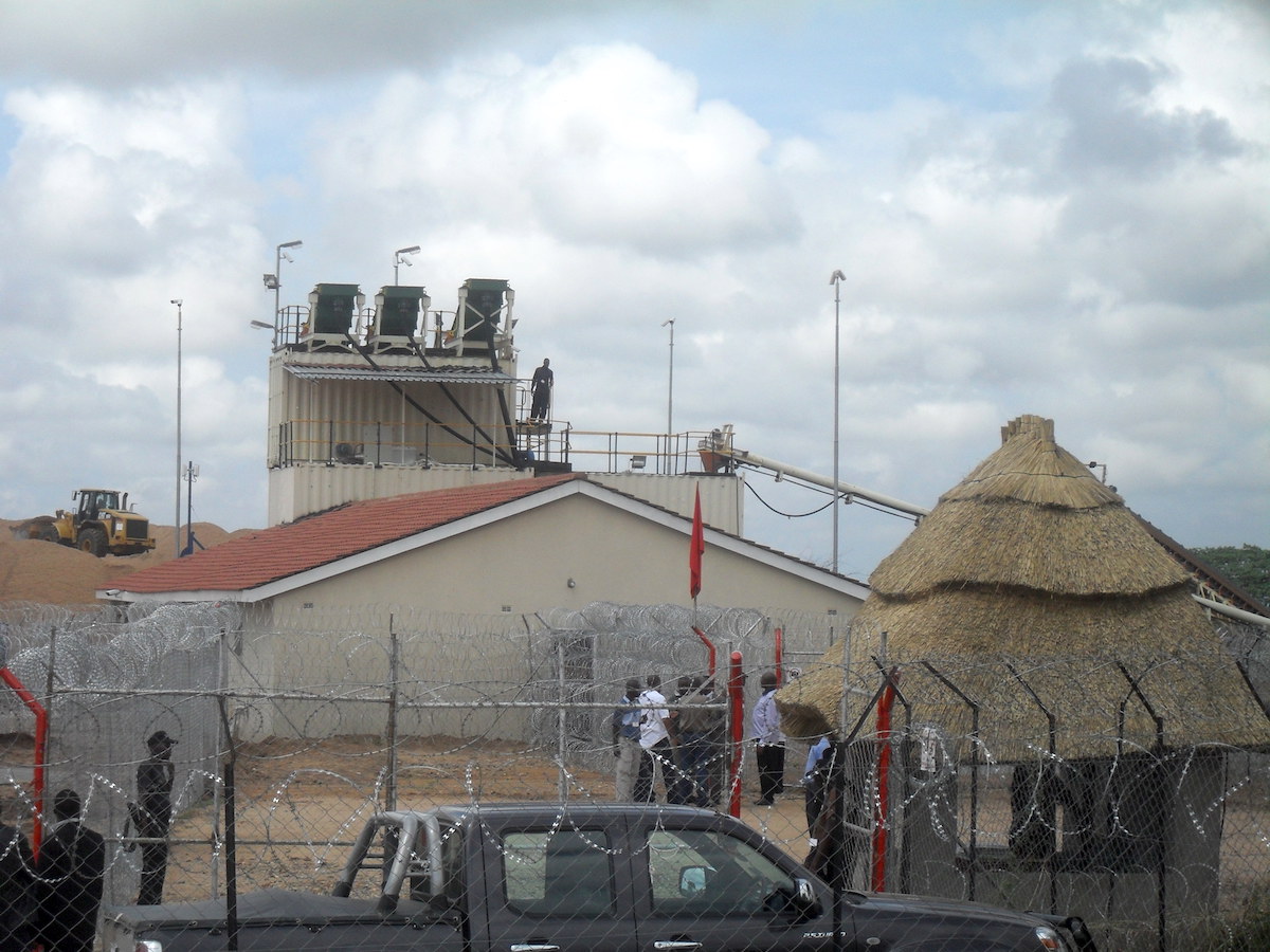 High security fence at the Marange diamond fields. Security is tight but poverty in nearby communities drives many to attempt to break in and pan for diamonds illegally. Those caught risk beatings and torture by government and mine security forces. Photo by Andrew Mambondiyani.