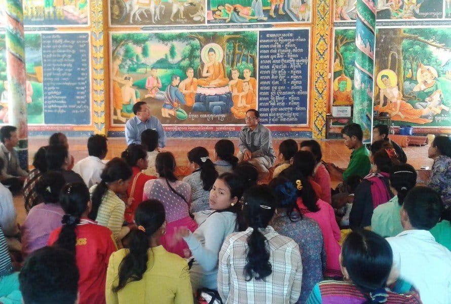 Senator Ly Yong Phat (front left) attends a meeting at Koh Sdach Temple in February 2015 to try and come to agreement with villagers about compensation for land. Photo by Rod Harbinson.