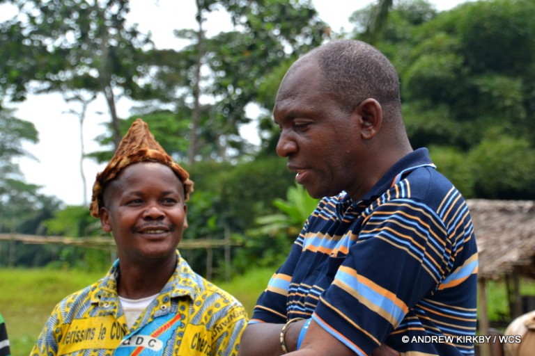 CCN Kahuzi-Biega Park Chief Park Warden Radar Nishuli talks with a traditional leader. Photo courtesy of Andrew Kirkby / WCS.