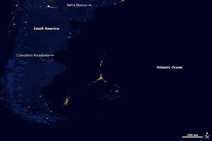 Fishing boats adorned with lights for night fishing are picked up by the Suomi-NPP satellite. This is the second-largest squid fishery on the planet. Image courtesy of NASA Earth Observatory/NOAA National Geophysical Data Center