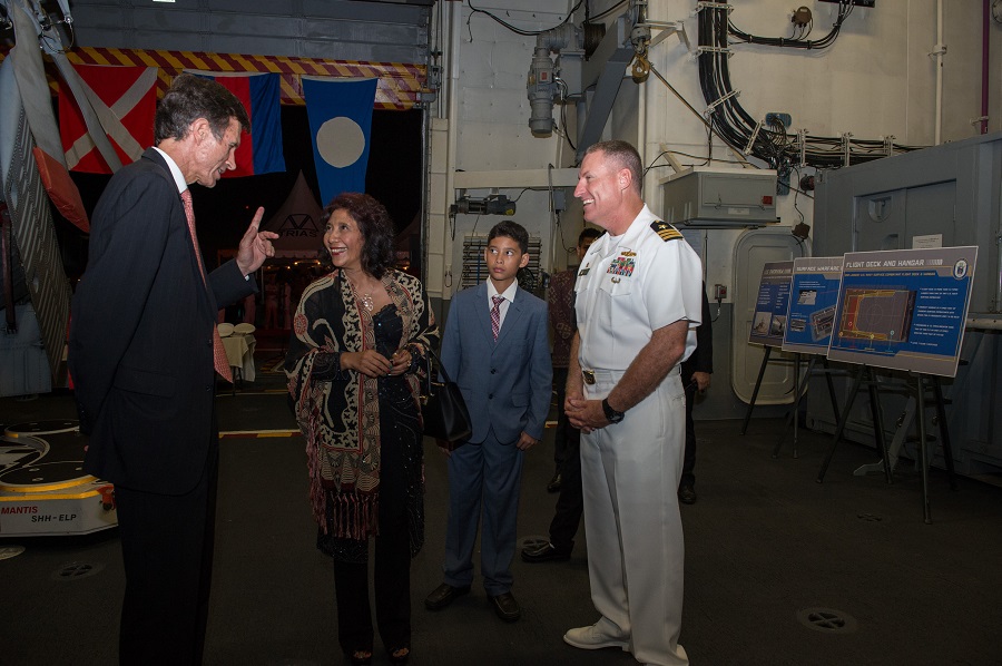 Indonesian fisheries minister Susi Pudjiastuti, center, speaks with Robert Blake, the U.S. ambassador to Indonesia, left, during a reception on board a U.S. combat ship while in port in Jakarta. Photo courtesy U.S. Pacific Fleet