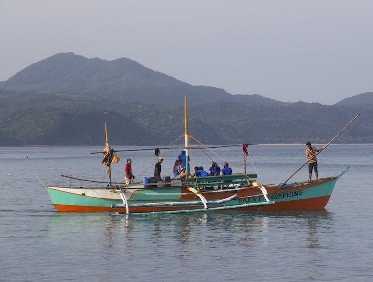 A local Babuyan Island outrigger fishing boat that Jo Marie Acebes refitted as a research vessel, North Philippines. Photo by Melati Kaye