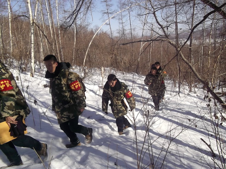 Forestry personnel conduct an anti-poaching patrol in the forest of Hunchun in March, 2012. Photo courtesy of Hunchun Forestry Bureau