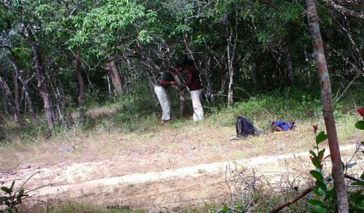 Anjali-and-research-assistant-Riahn-setting-up-a-camera-trap