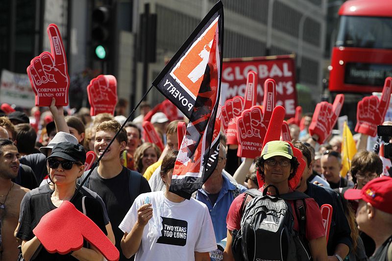 A 2014 protest in London against the proposed TTIP treaty (Transatlantic Trade and Investment Partnership). Huge public demonstrations have come out against the TTIP’s secret treaty negotiations that opponents say benefit investors while endangering the environment, dismantling labor rights, and threatening democracy. Photo courtesy of the World Development Movement licensed under the Creative Commons Attribution 2.0 Generic license