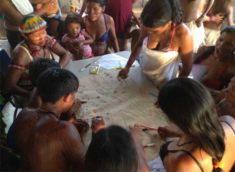 Indigenous Munduruku living on the Teles Pires River taking part in a mapping workshop. Indigenous people and river communities have seen, and will continue to see territory lost, fisheries disrupted and depleted, and food security diminished, with the construction of the Tapajós Complex. Photo by International Rivers on Flickr, licensed under an Attribution-NonCommercial-ShareAlike 2.0 Generic (CC BY-NC-SA 2.0) license