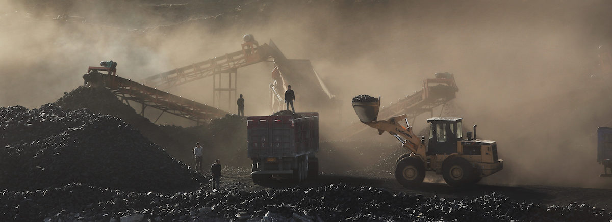 The Wujiata Open Pit Coal Mine near Ulan Moron, China, fills the air with coal dust. Photo by Qui Bo/Greenpeace.