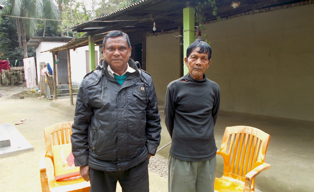 Babulal Orang, a retired forest guard, with Binay Orang, the village headman of Raghavbil village. Photo by Bikash Kumar Bhattacharya for Mongabay. Babulal Orang, a retired forest guard, with Binay Orang, the village headman of Raghavbil village. Photo by Bikash Kumar Bhattacharya for Mongabay.