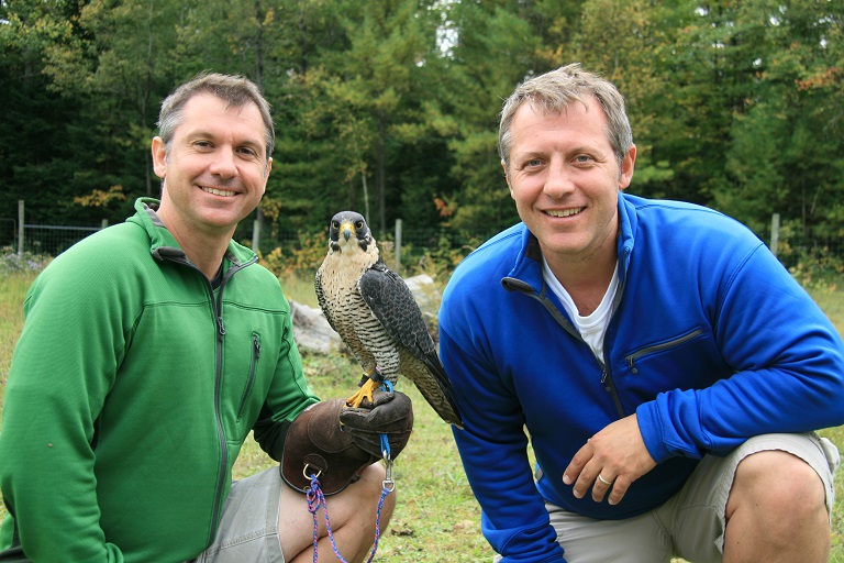 Chris Kratt (l) and his brother Martin Kratt with a lanner falcon. Courtesy Kratt Brothers Company Ltd.