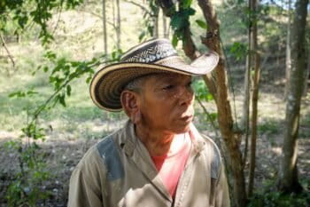 Argemiros Capela stands on his lot in front a small patch of forest that has started to grow back after years of desertification, Montes de Maria. Photo by Ana Cristina Vallejo/Mongabay.