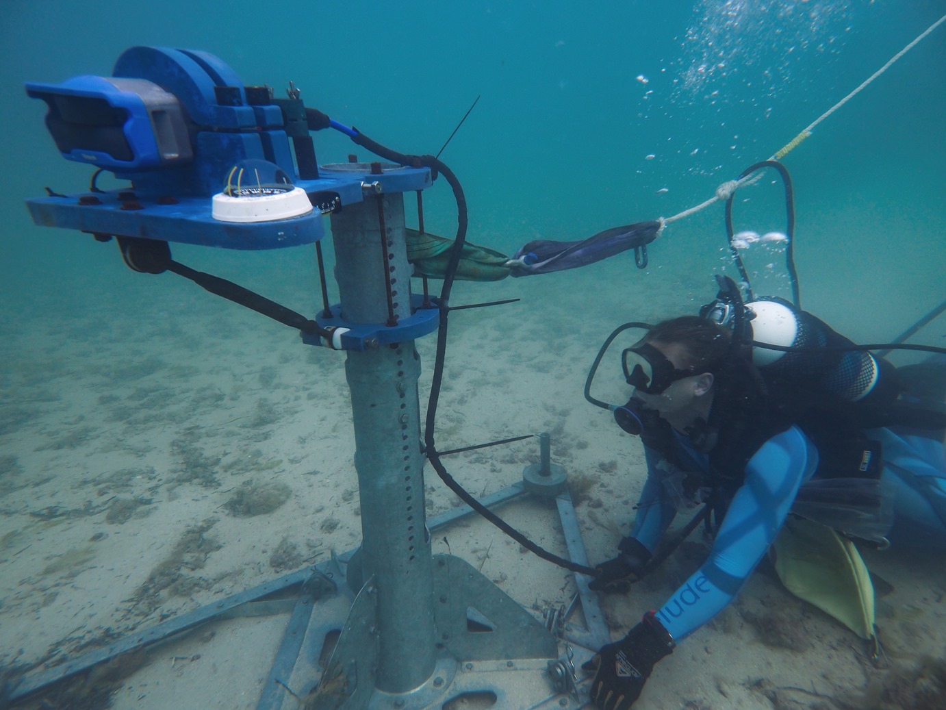 Installing the seabed frame with the sonar transducer on the ocean floor. 