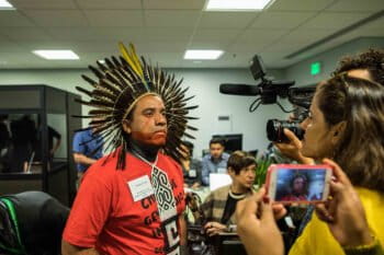 Dinamam tuxá from APIB (Articulation of the Indigenous People of Brazil) at a press conference announcing the funders' commitment. Photo by Reny Preussker.