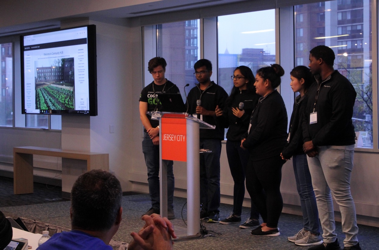 One of the finalist teams presents their web application to the audience. 