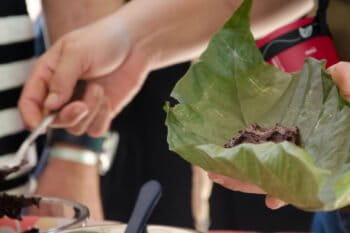 Chocolate is wrapped in a cocoa tree leaf. Photo by Sarita Reed.