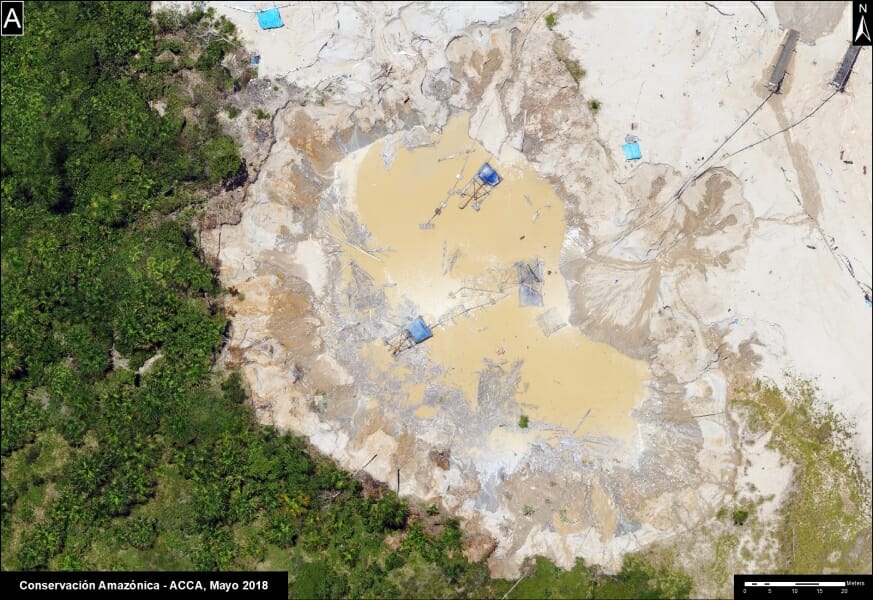 Devastation of the Madre de Dios forest landscape due to illegal mining, shown from a drone-based image along the newly paved Interoceanic Highway. 