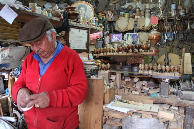 Jorge Rivadeneira Granda at his shop and workshop in Quito, Ecuador. Photo by Kimberley Brown for Mongabay.