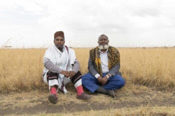 Aba Gada Kabeto Edamo Wabe(r), leader of the Oda Roba and Aba Gada Azmach Teshita, Sammato Bullo (l) leader of the Hambentu clan pose for a portrait inside Senekele Swayne’s Hartebeest Sanctuary. Photo by Maheder Haileselassie Tadese.