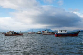 Fishing boats in Seno de Última Esperanza (Last Hope Sound), in southern Chile. Image by Robert Nunn via Flickr.