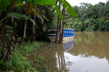 The passenger boat that sits empty and unused outside of Andres Machoa’s home in Llanchama, a symbol of unfulfilled promises by the oil industry. Photo by Kimberley Brown for Mongabay.