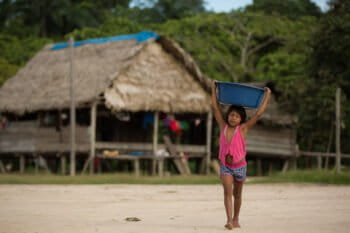 Kanamari indigenous child in Vale do Javari, in Amazonas state, one of the most vulnerable indigenous reserves to COVID-19, according to an analysis by the Socioenvironmental Institute (ISA), a Brazilian NGO. Image by Bruno Kelly/Amazônia Real