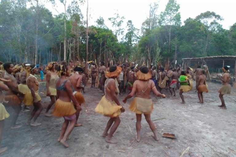 The Kombai people dance during the sago grub feast in Boven Digoel, Papua. Image by Hans Nicholas Jong/Mongabay.