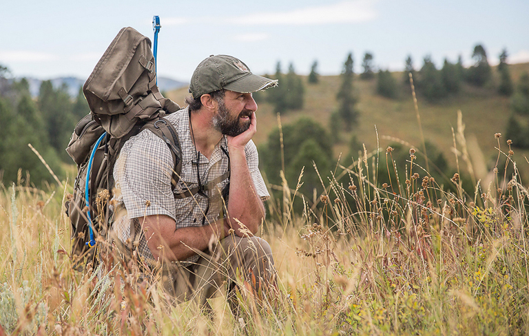 Biologist Mark Elbroch in the field. Image by Dave Moskowitz.