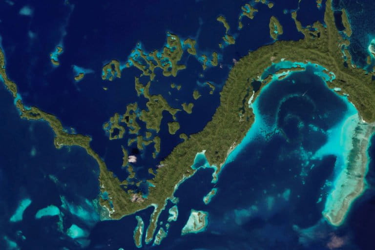 Satellite image of lagoons and reefs in Palau. © Zoom.Earth