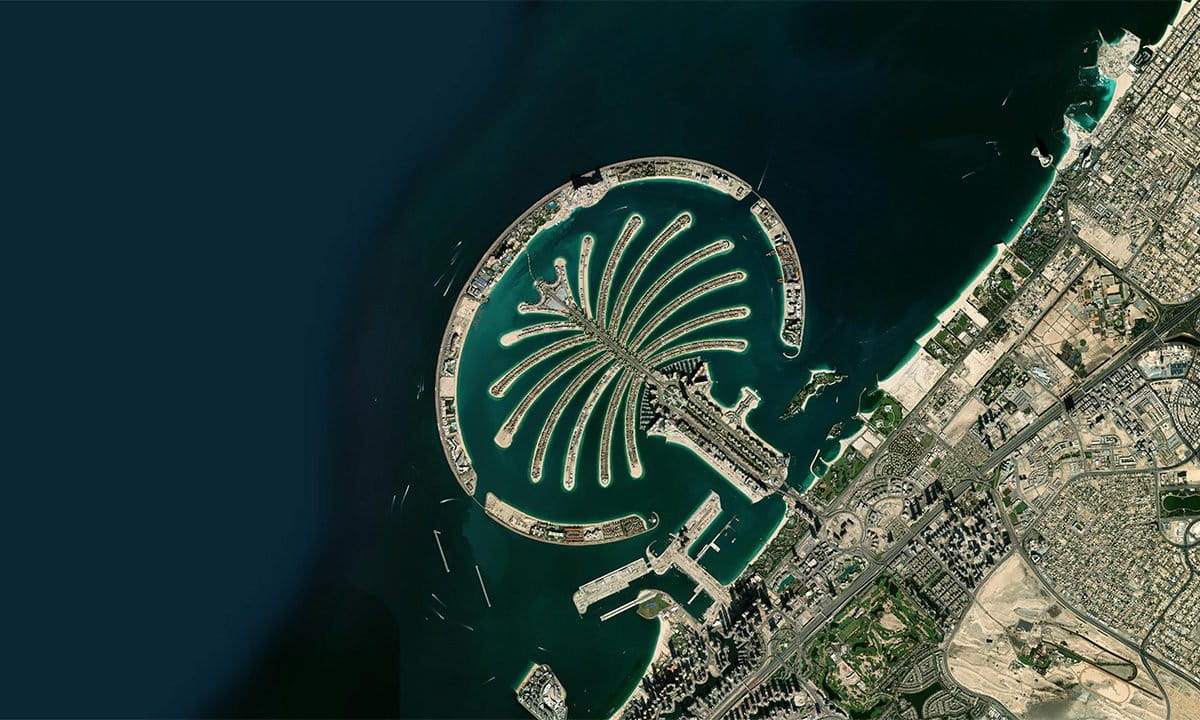 Palm Jumeriah, an artificial island, off the coast of Dubai. Photo credit: Zoom.Earth / Maxar Technologies