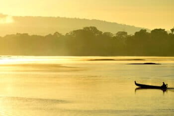 A canoe on the Maroni river, which forms the border between French Guiana and Suriname. Photo © Didier Gentilhomme.