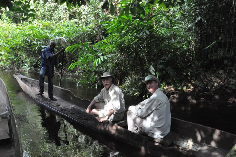 Rodger Schlickeisen and a colleague in a canoe in the Congo Basin.