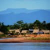 Banner image: Houses of Shawi community residents on the banks of the Paranapura River in Peru.