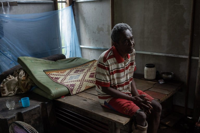 Su Phon at his home in Tatai village, Koh Kong province. People from Phnom Penh recently approached him to buy his 1-hectare (2.5-acre) plot of land, for which he has a hard land title. Image by Andy Ball.