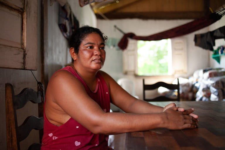 Josiane dos Santos, tuxaua -- or leader -- of the Trincheira village in her home in the Indigenous territory. “In the future, we won't have any more water, we won’t have any more forest, we won’t have land to plant. It’s a great loss for us.” Mongabay by Ana Ionova.