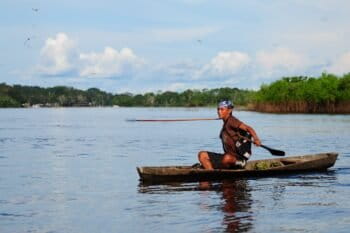 Tikuna man fishing in Colombia