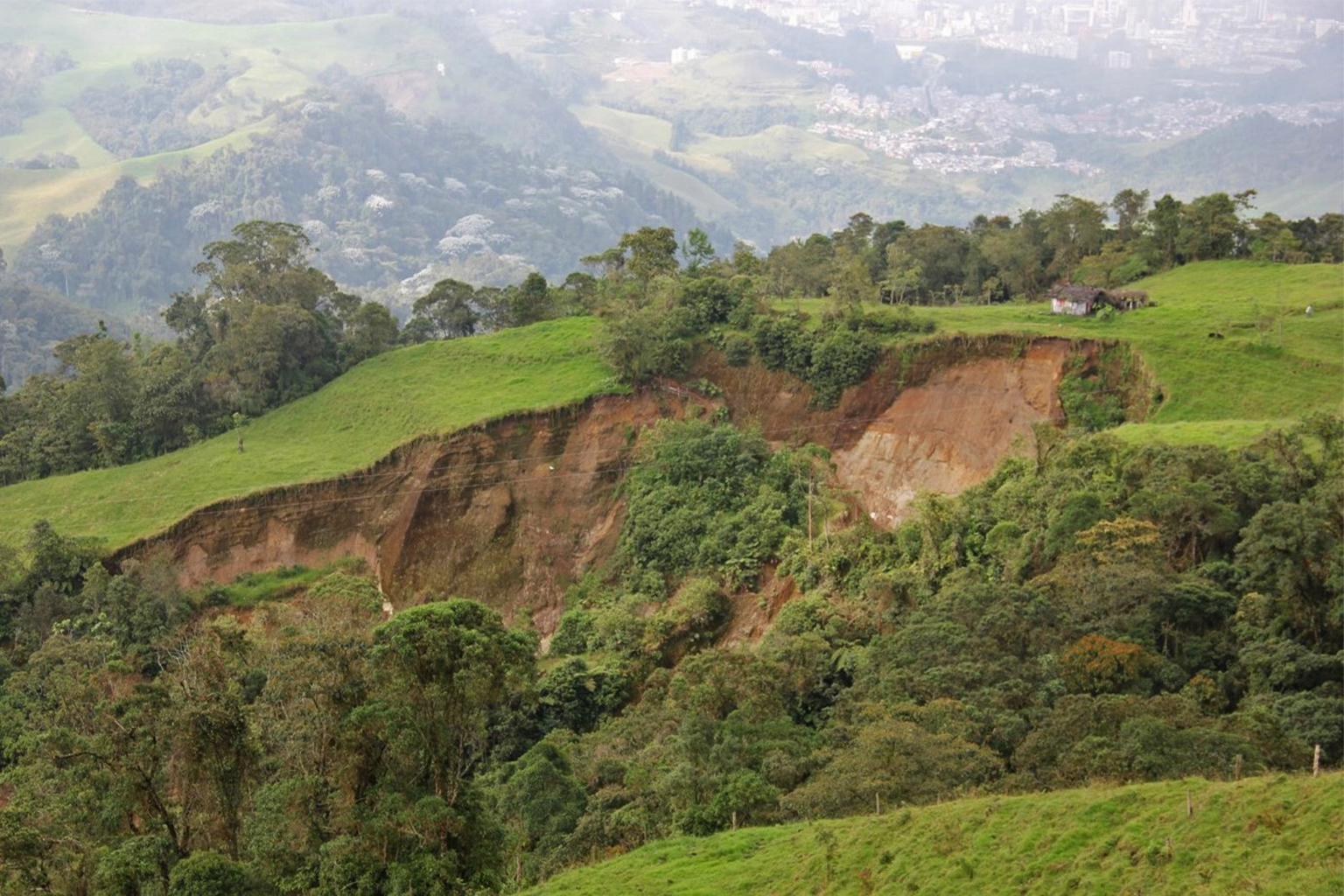 A landslide near Manizales in the Central Andes. In 2011, a landslide broke a pipe supplying water from the cloud forests and paramos into city, leaving hundreds of thousands of people without access to water for 10 days. 