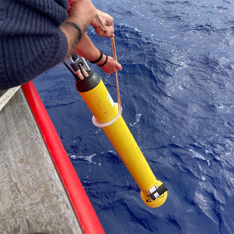 Scientists deploying a SOCCOM robot float. 