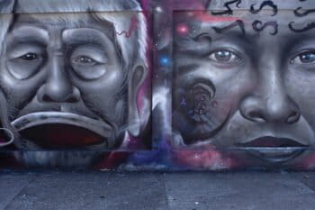A mural depicting Indigenous faces stretches across a wall in the historic center of Manaus, in the Brazilian state of Amazonas.