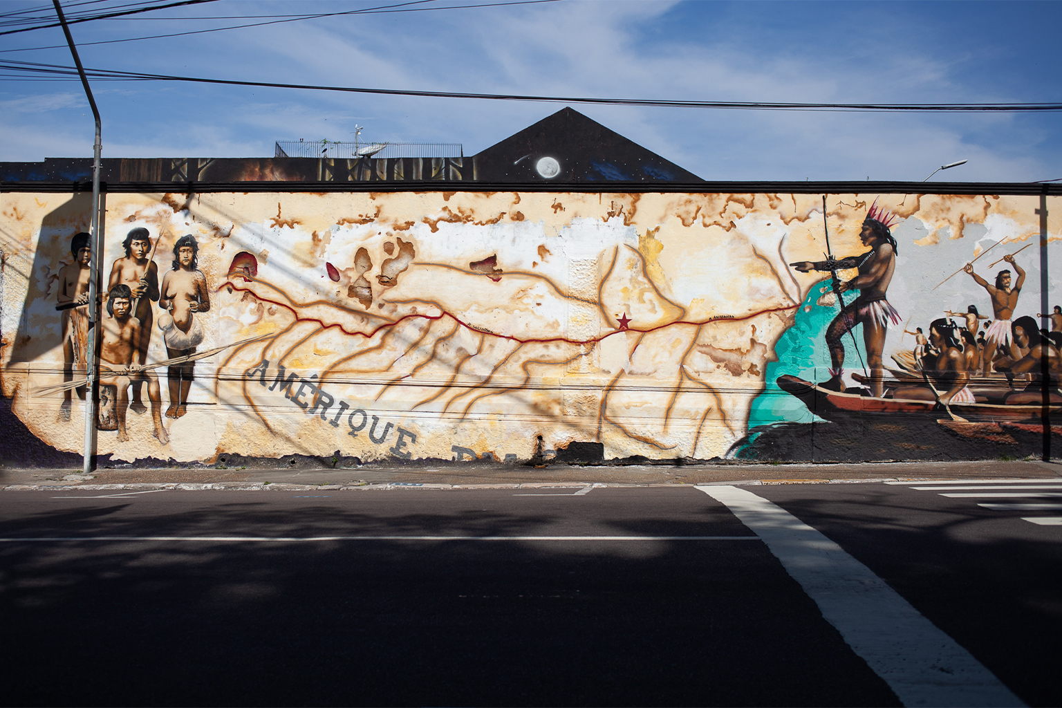 This mural, called “The Village of Indigenous Memory of Manaus,” stands on a site that was once an Indigenous cemetery, before Europeans built a plaza on top of it in the 1800s. 