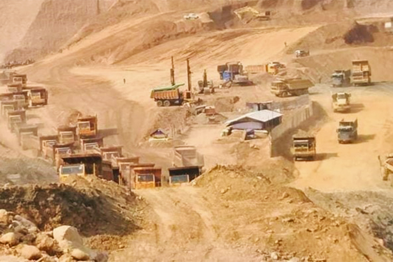 Companies use heavy machinery at jade mining sites in Hpakant.