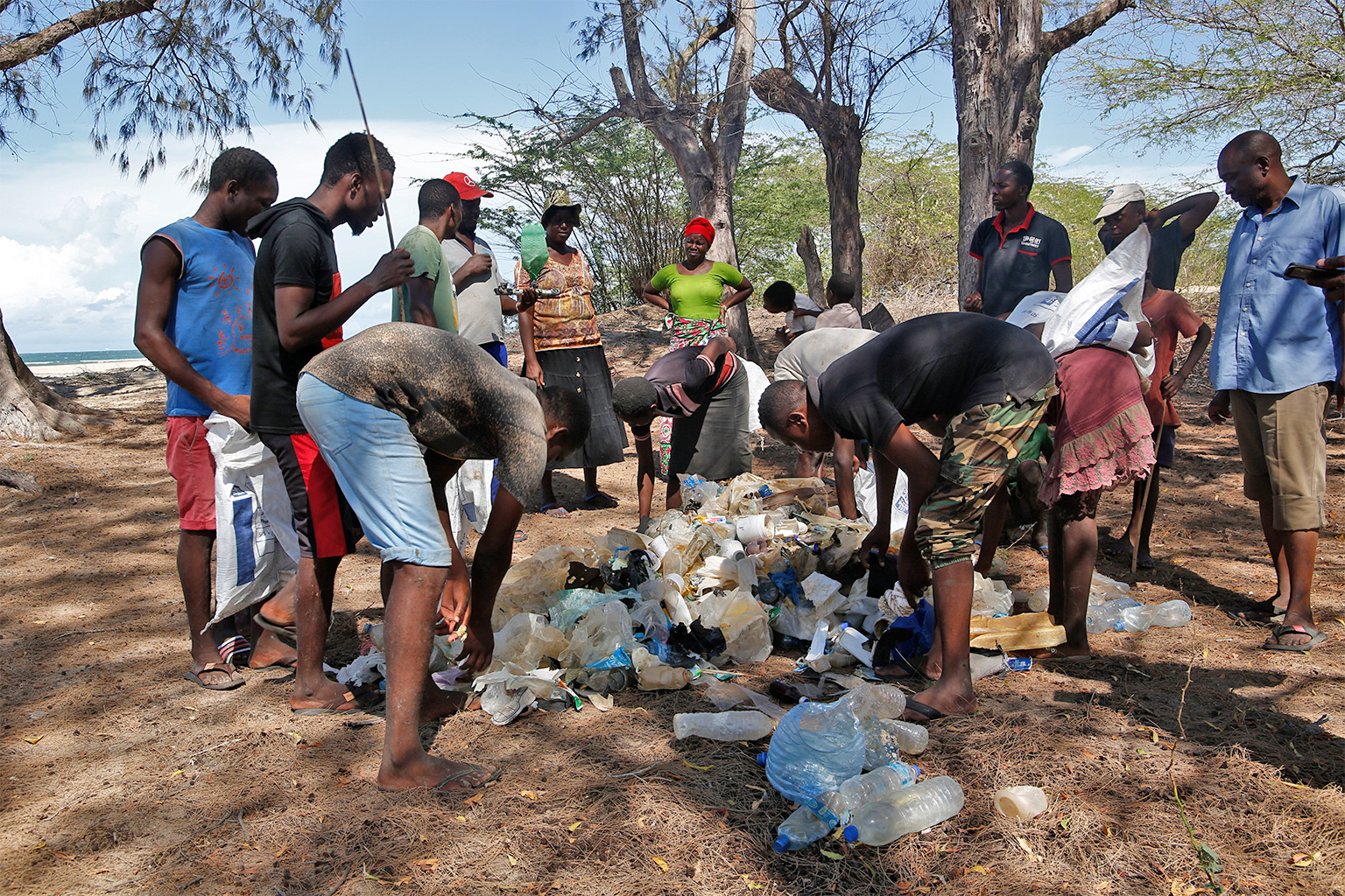 Marereni Biodiversity Conservancy members sorting garbage after a beach cleanup on the shores of the Indian Ocean in Marereni, Kenya. 