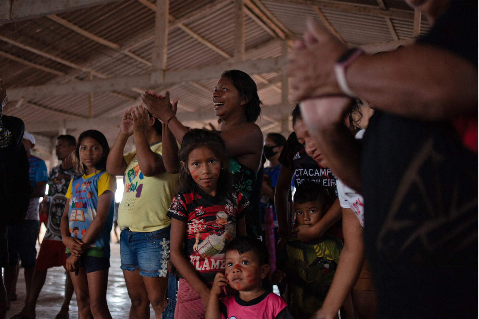 Residents of the Mura Indigenous village of Murutinga, in Brazil’s Amazonas state, gather for a community meeting in September 2021. The Mura live in dozens of villages scattered across the municipalities of Autazes and Careiro da Várzea. But many of their territories have not been officially recognized by the Brazilian government, with communities struggling for decades to gain land rights. Image by Ana Ionova for Mongabay.