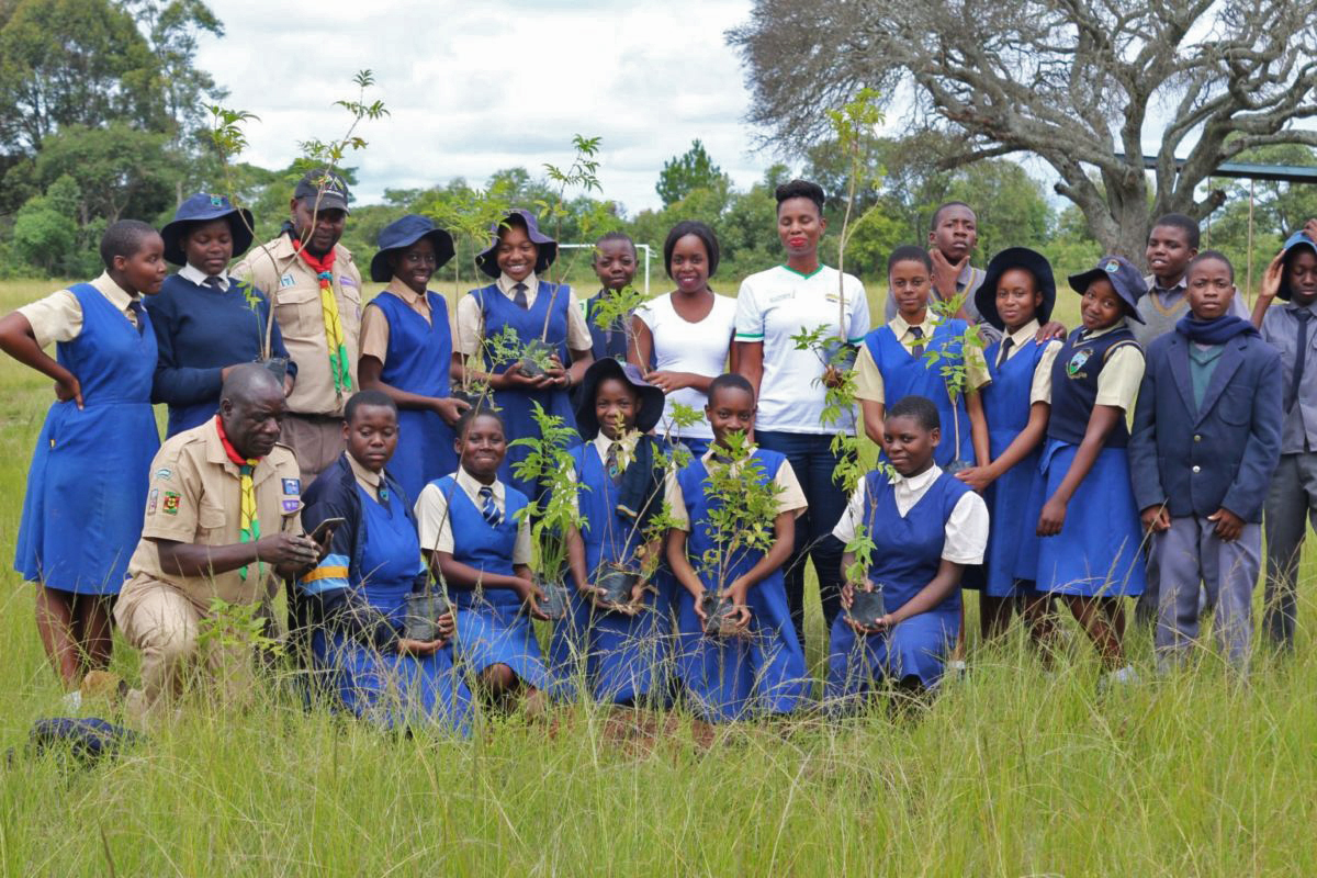 A moment during a Waddilove High School tree-planting project in partnership with the Scouts Association of Zimbabwe in 2019.