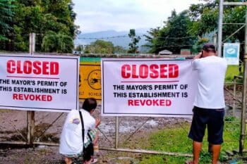 Tampakan government employees close a facility belonging to Sagittarius Mines, Inc.