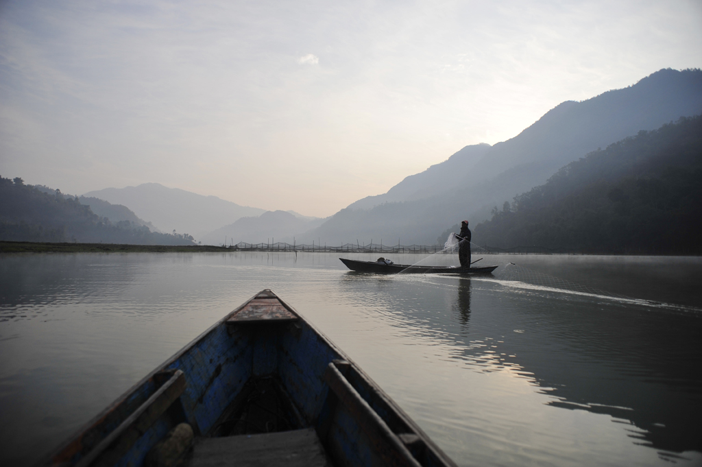 Fishing in a lake in Nepal.