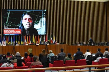 Tewe Dayuma Michela Conta, one of the girls kidnapped from the Tagaeri and Taromenane territory, speak during the trial. Image courtesy of the Inter-American Court of Human Rights via Flickr (CC BY-SA 2.0).