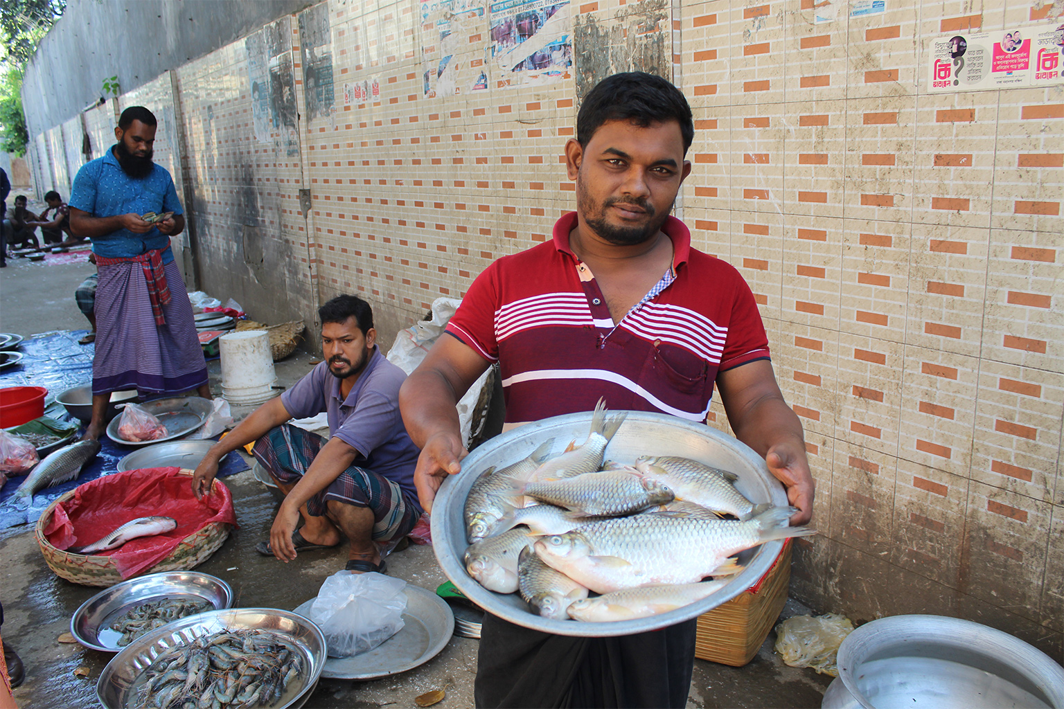 A fisherman with fish.