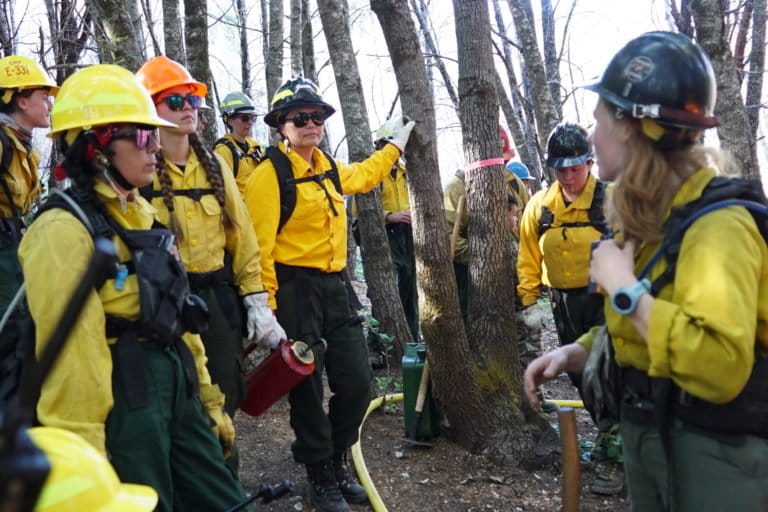 The start of burn practices by Indigenous people participating in a fire training event in October 2022. Images by bay laurel O'Connor/courtesy of the Karuk Tribe.