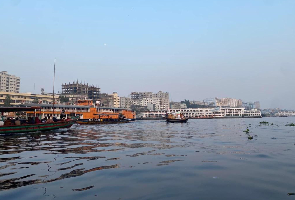 Pitch-black water of Buriganga River.