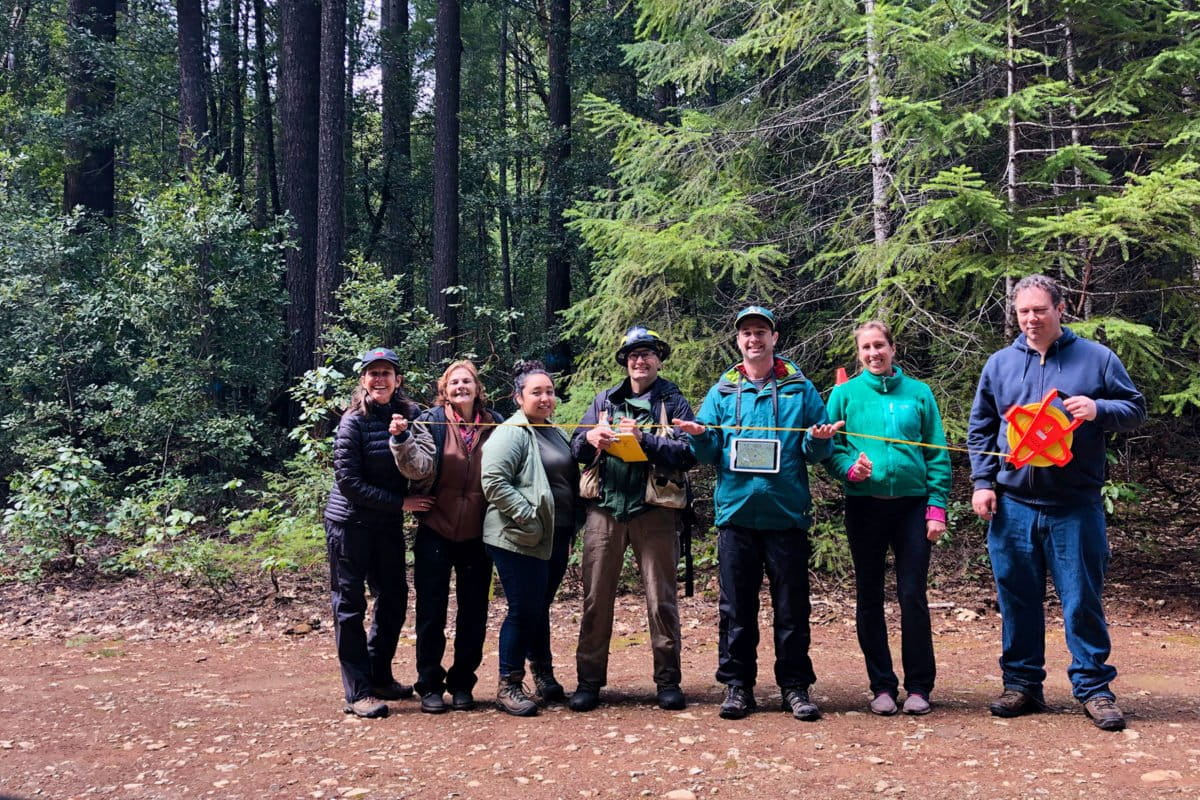 The core team of individuals who worked together on the Karuk Agroecosystem Resilience Initiative project. From left to right: Jennifer Sowerwine, Kathy McCovey, Vikki Preston, Frank Lake, Dan Sarna-Wojcicki, Megan Mucioki, Shay Bourque. Image courtesy of the Karuk – UC Berkeley Collaborative